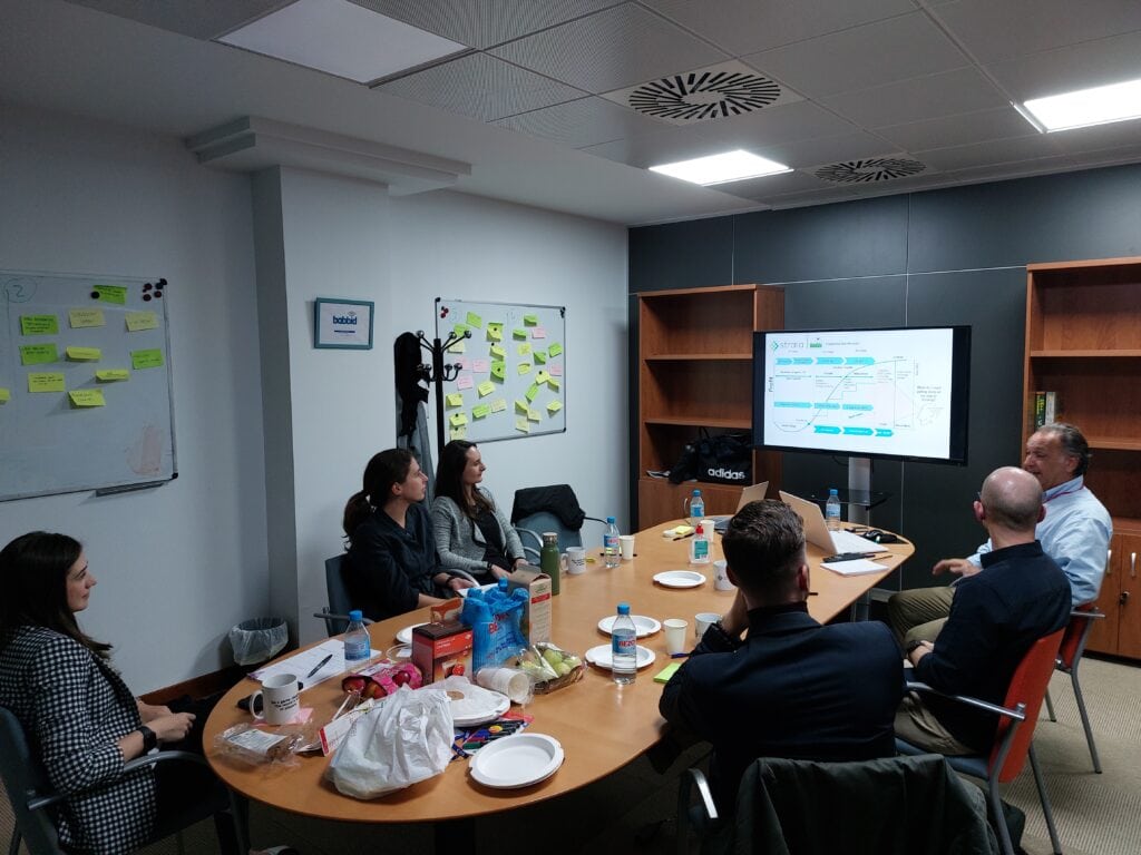 Strata team colleagues discussing